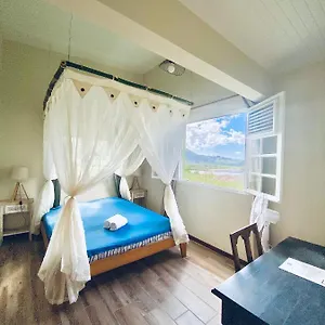 https://chambre-ylang-ylang-vue-mont-pelee.comcaribbean.com